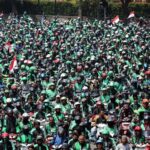 Ribuan pengemudi ojek online melakukan aksi menuju Istana Negara, Jakarta, Selasa (27/3/2018). tirto.id/ANdrey Gromico