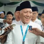 Pengasuh Pondok Pesantren Tebuireng, KH Abdul Hakim Mahfudz atau yang akrab disapa Gus Kikin, saat ditemui di arena Muktamar ke-35 NU di Pondok Pesantren Bahrul Ulum Tambakberas, Jombang, Jawa Timur, Jumat (28/8/2026) petang.(KOMPAS.COM/MOH. SYAFIÍ)
